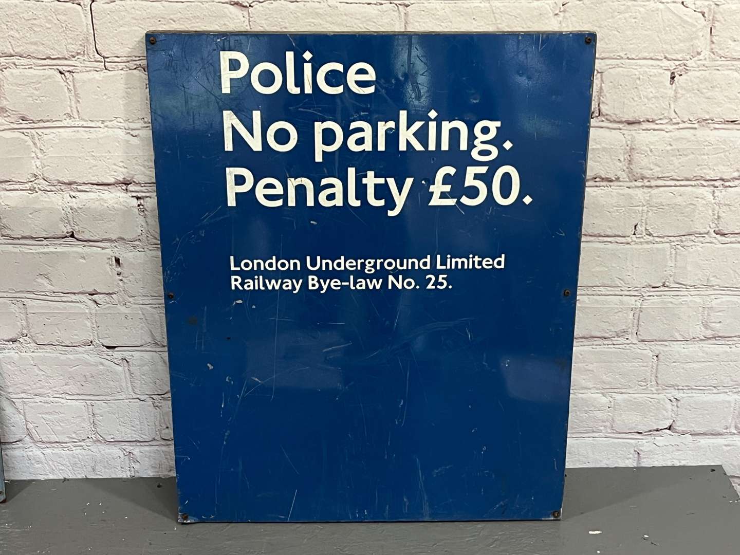 <p>London Underground Police No Parking £50 Fine Aluminium Sign</p>