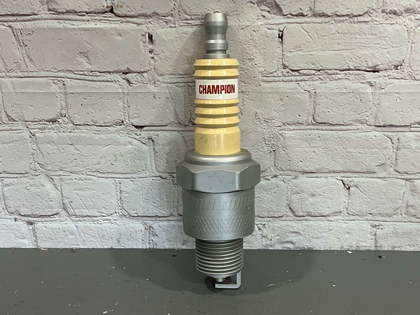 <p>Champion Spark Plug Display</p>