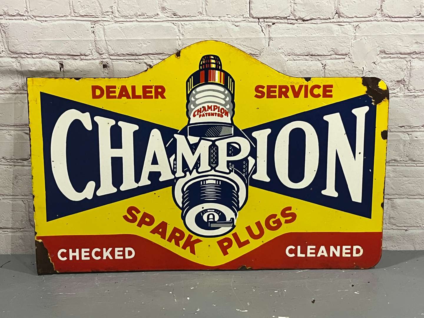 <p>Champion Spark Plug Dealer Enamel Sign</p>