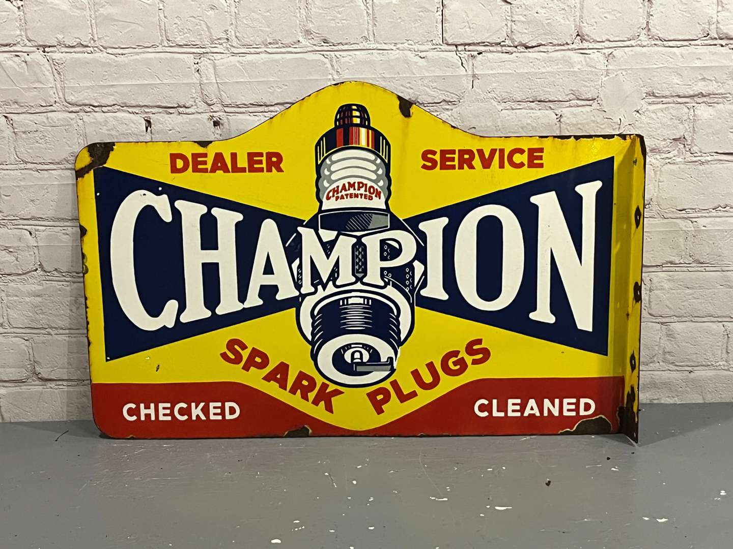 <p>Champion Spark Plug Dealer Enamel Sign</p>
