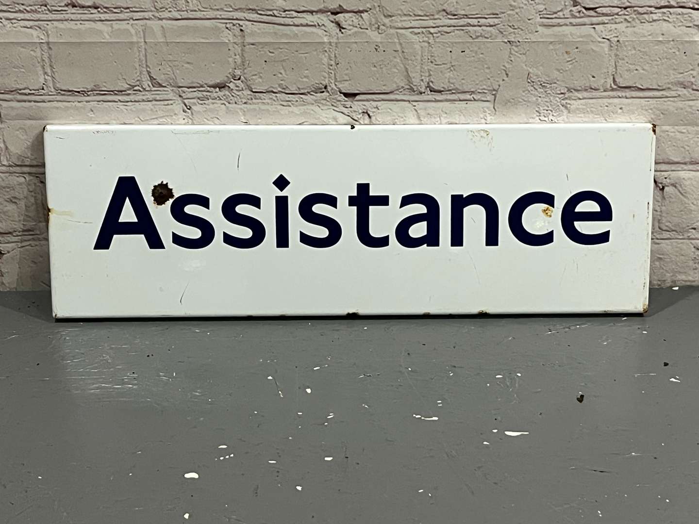 <p>Railway Assistance Enamel Sign</p>