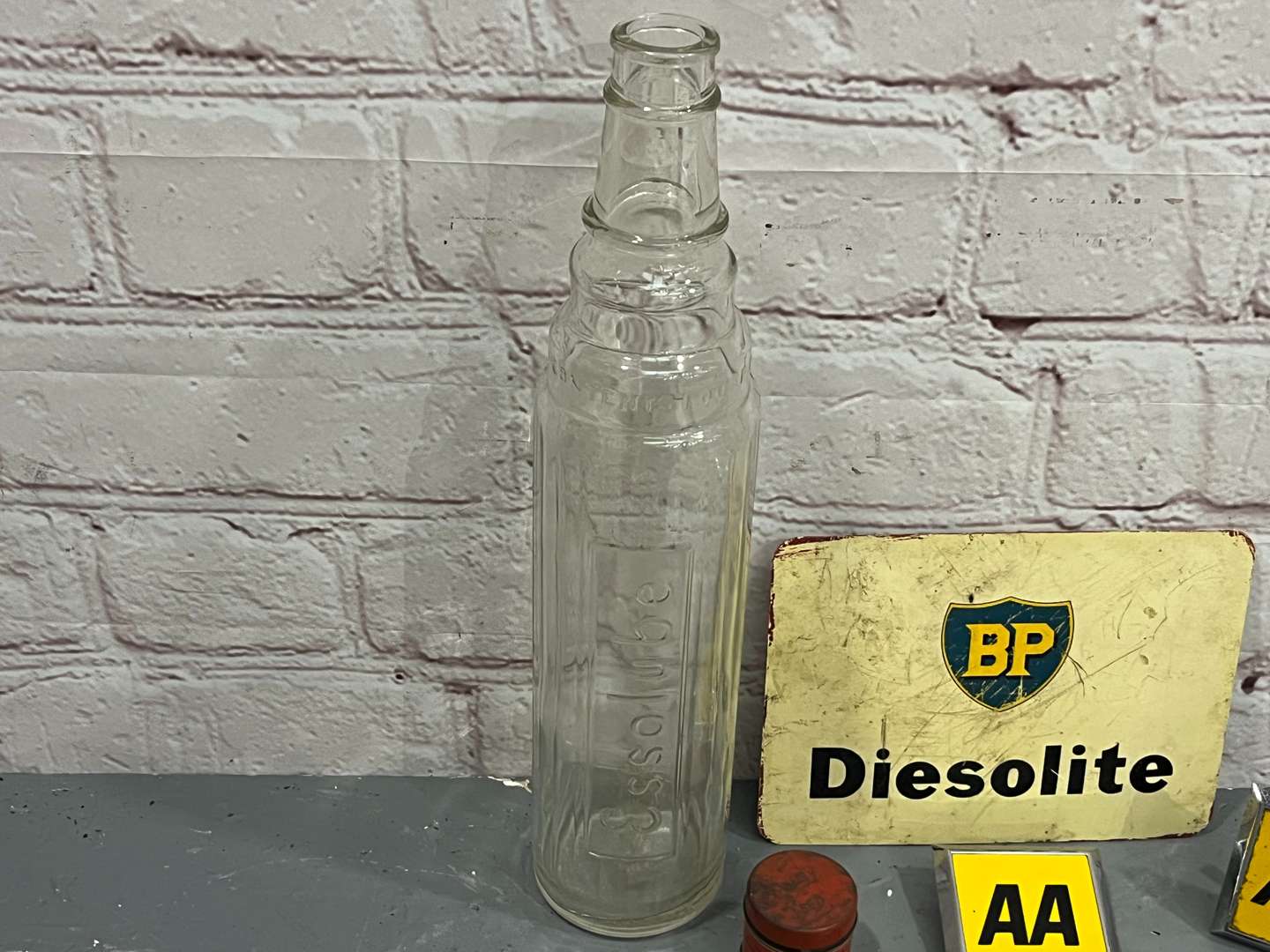 <p>Essolube Oil Bottle Quantity of Badges Etc</p>