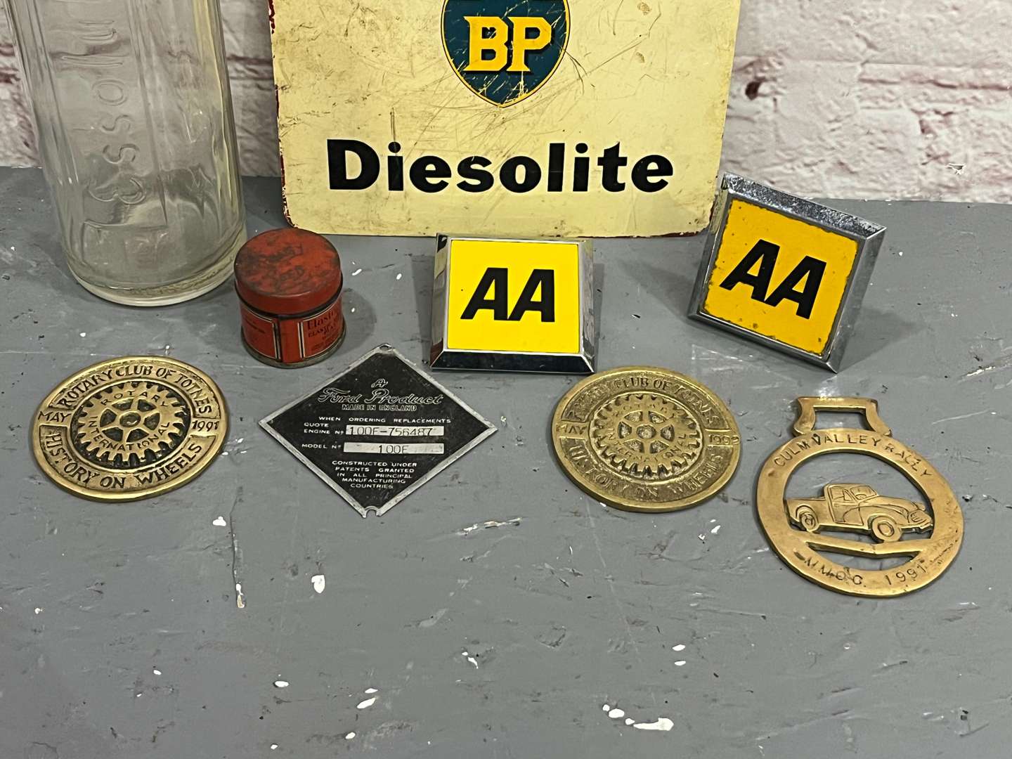 <p>Essolube Oil Bottle Quantity of Badges Etc</p>