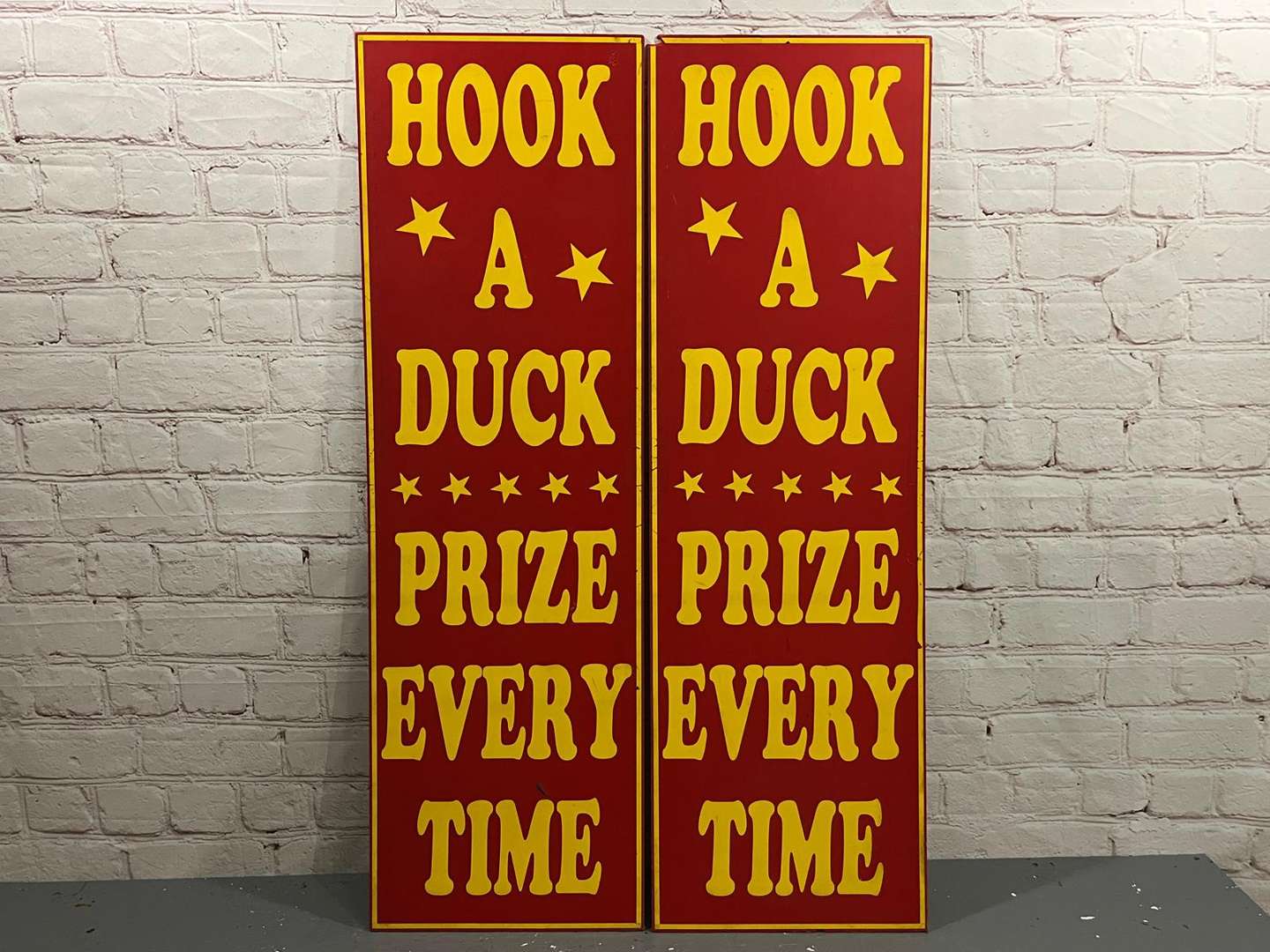 <p>Three Fairground “Hook a Duck” Signs on Plastic Board</p>