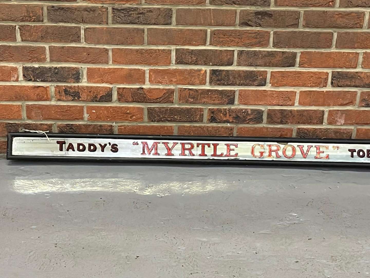 <p>Taddys 1920's&nbsp;“Myrtle Grove” Tobacco and Cigarettes Mirror</p>