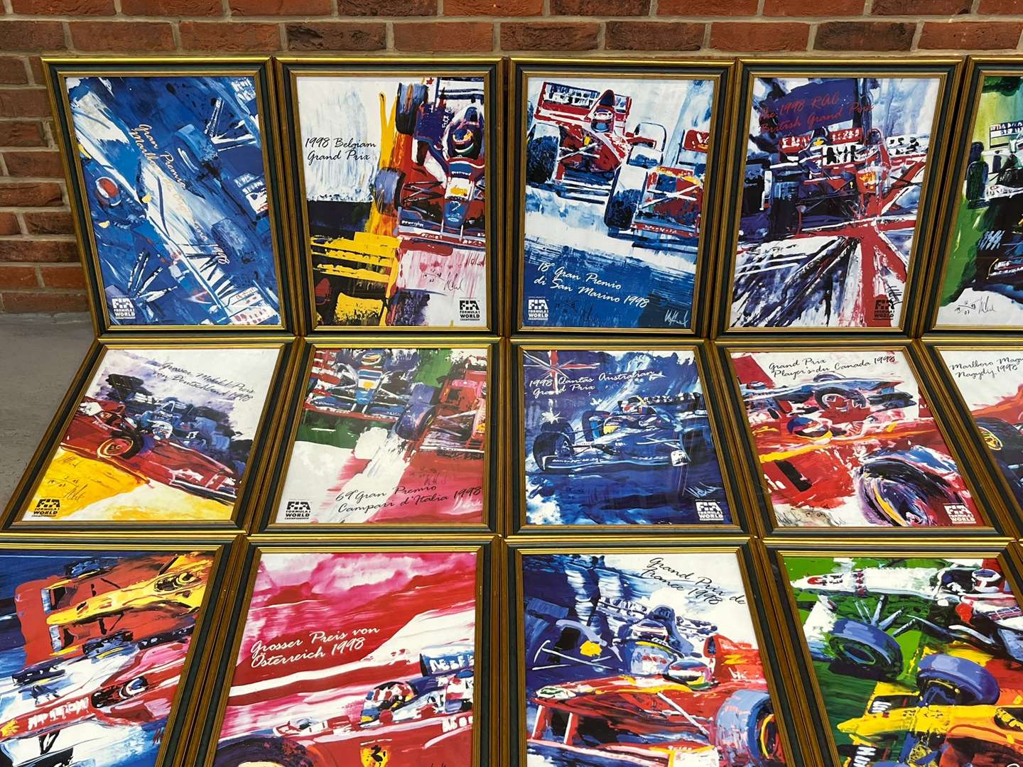 <p>Eighteen Framed Racing Prints</p>