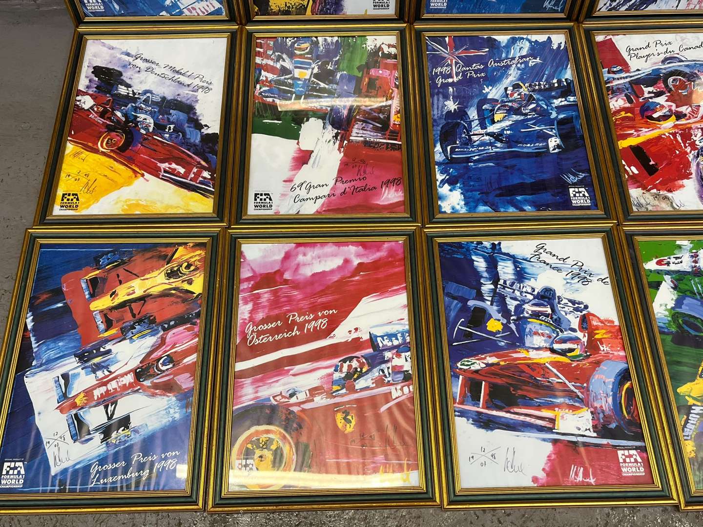 <p>Eighteen Framed Racing Prints</p>