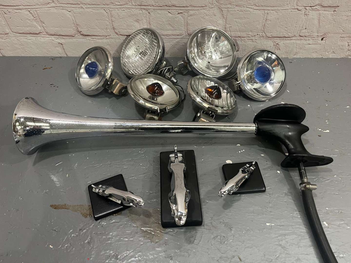 <p>Pair Lucas Spot Lights, Pair Fog Lights, 3 Jaguar Mascots Etc</p>