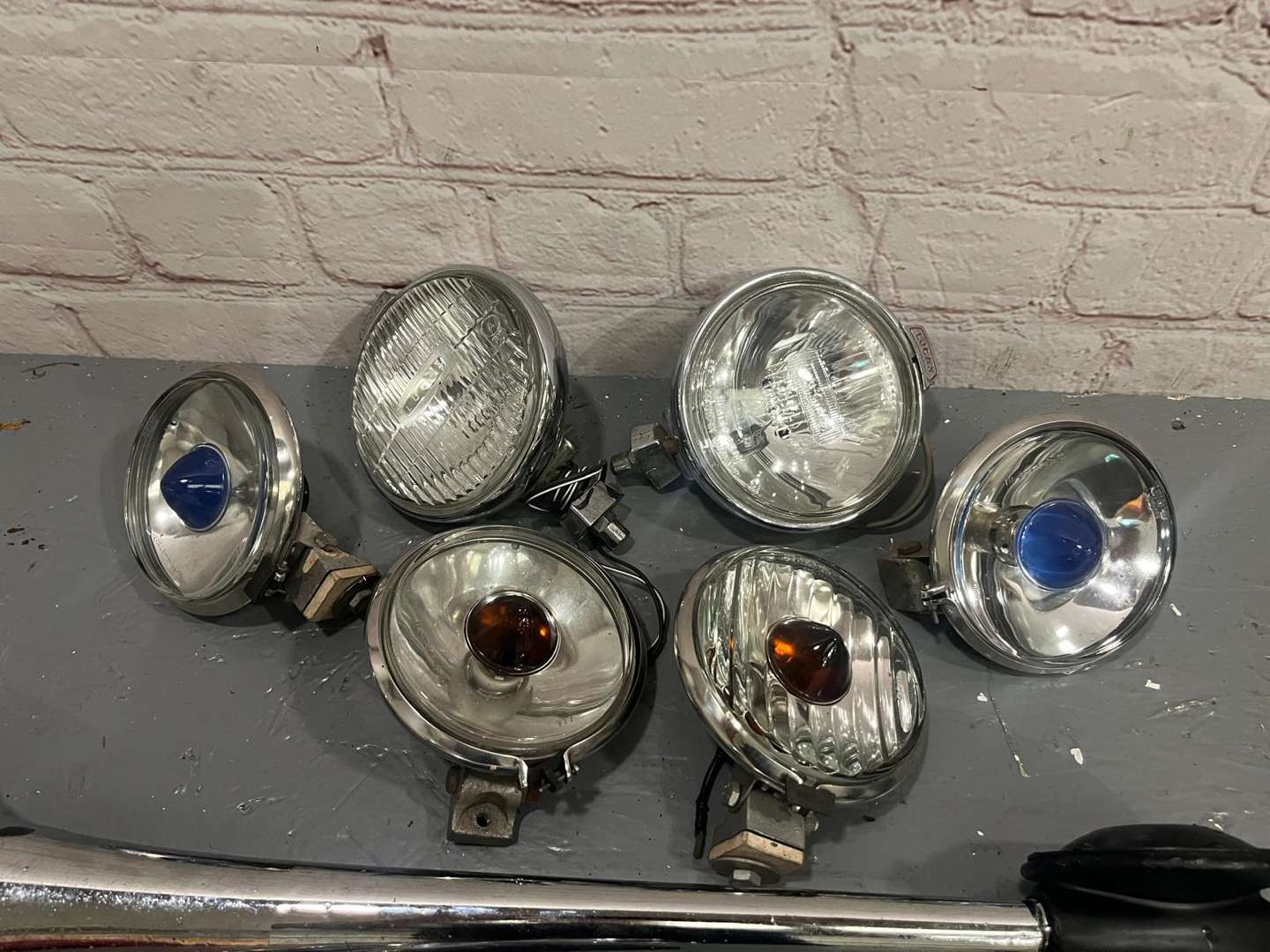 <p>Pair Lucas Spot Lights, Pair Fog Lights, 3 Jaguar Mascots Etc</p>