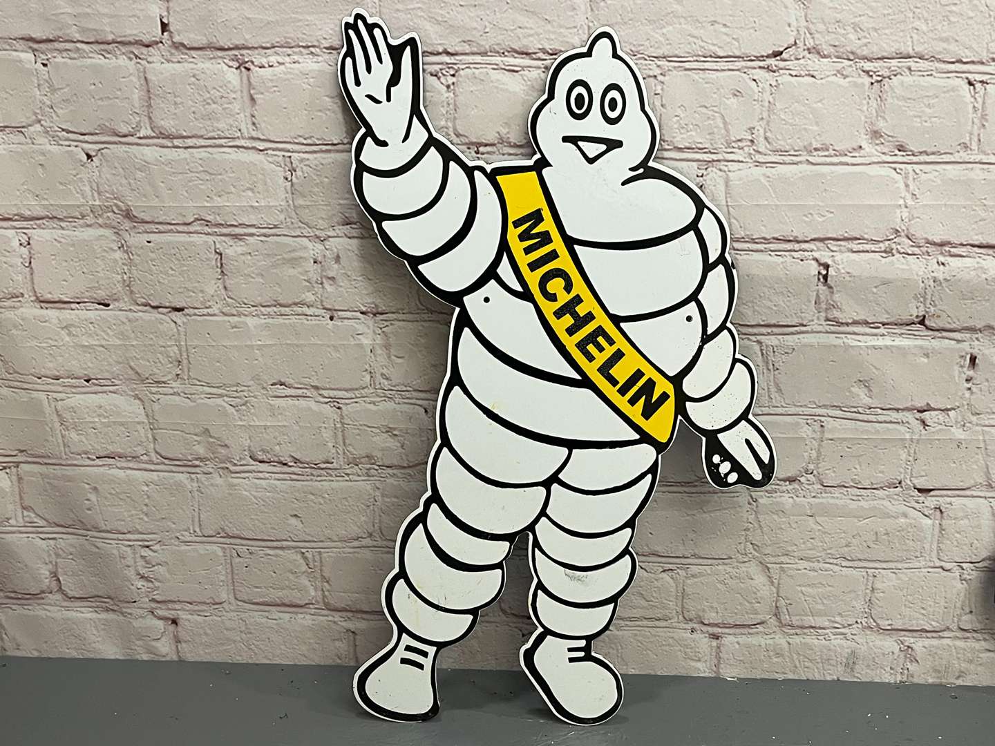 <p>Michelin Waving Man Enamel Sign</p>