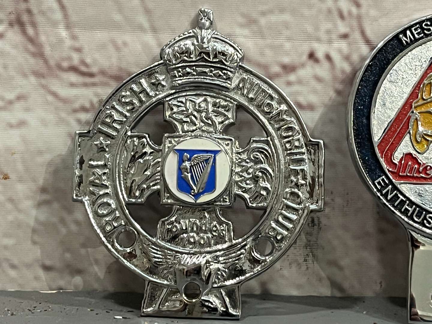 <p>Three Classic Car Badges&nbsp;</p>