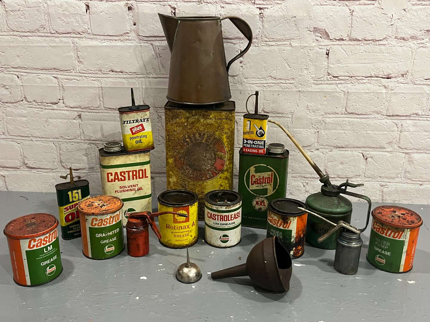 <p>Quantity of Castrol, Shell Grease and Oil Cans</p>