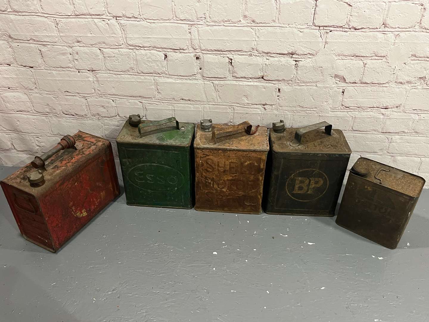 <p>Three, Two Gallon Fuel Cans Etc</p>