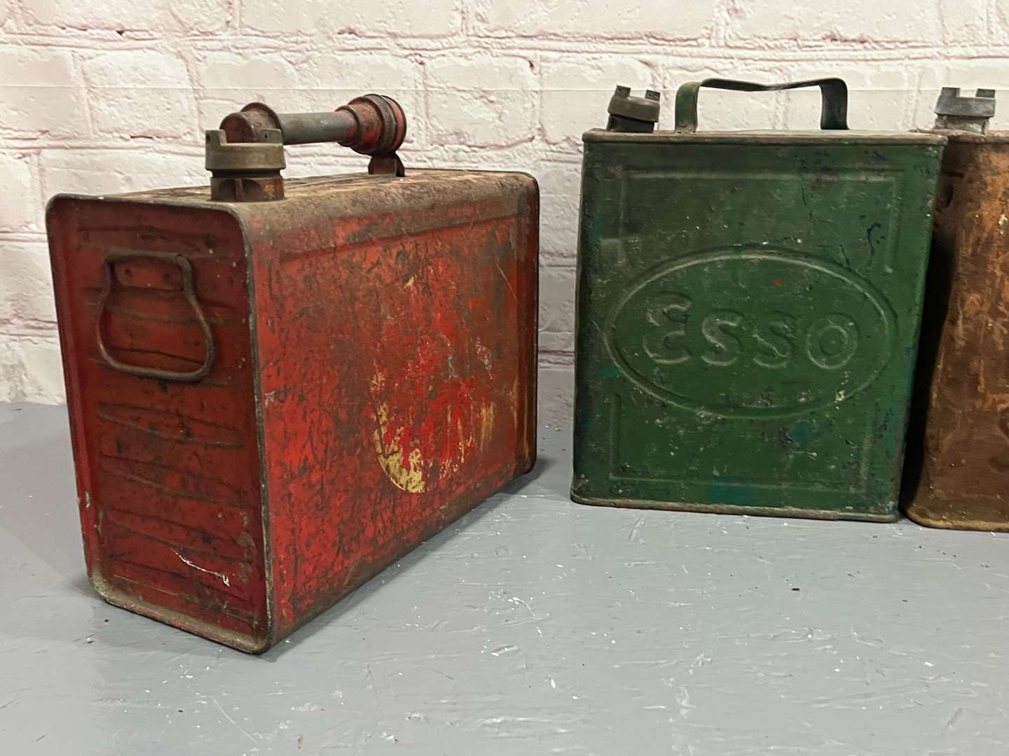 <p>Three, Two Gallon Fuel Cans Etc</p>