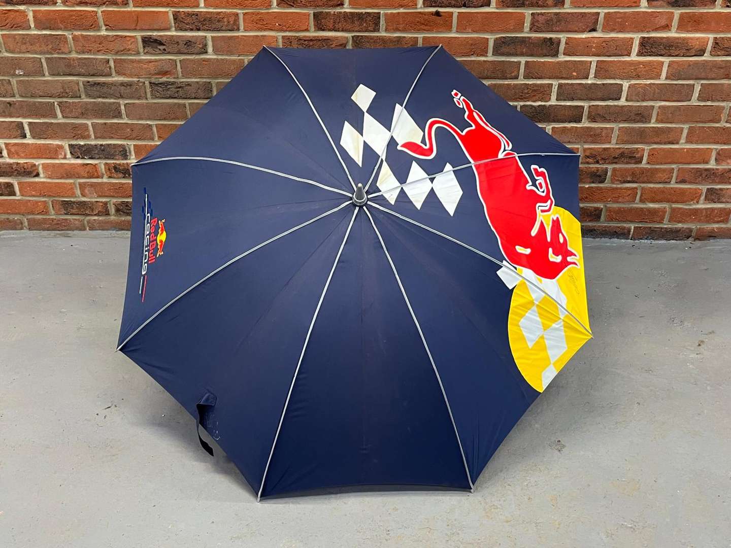 <p>Red Bull Umbrella Signed By Sebastian Vettel & Mark Webber (With COA)</p>