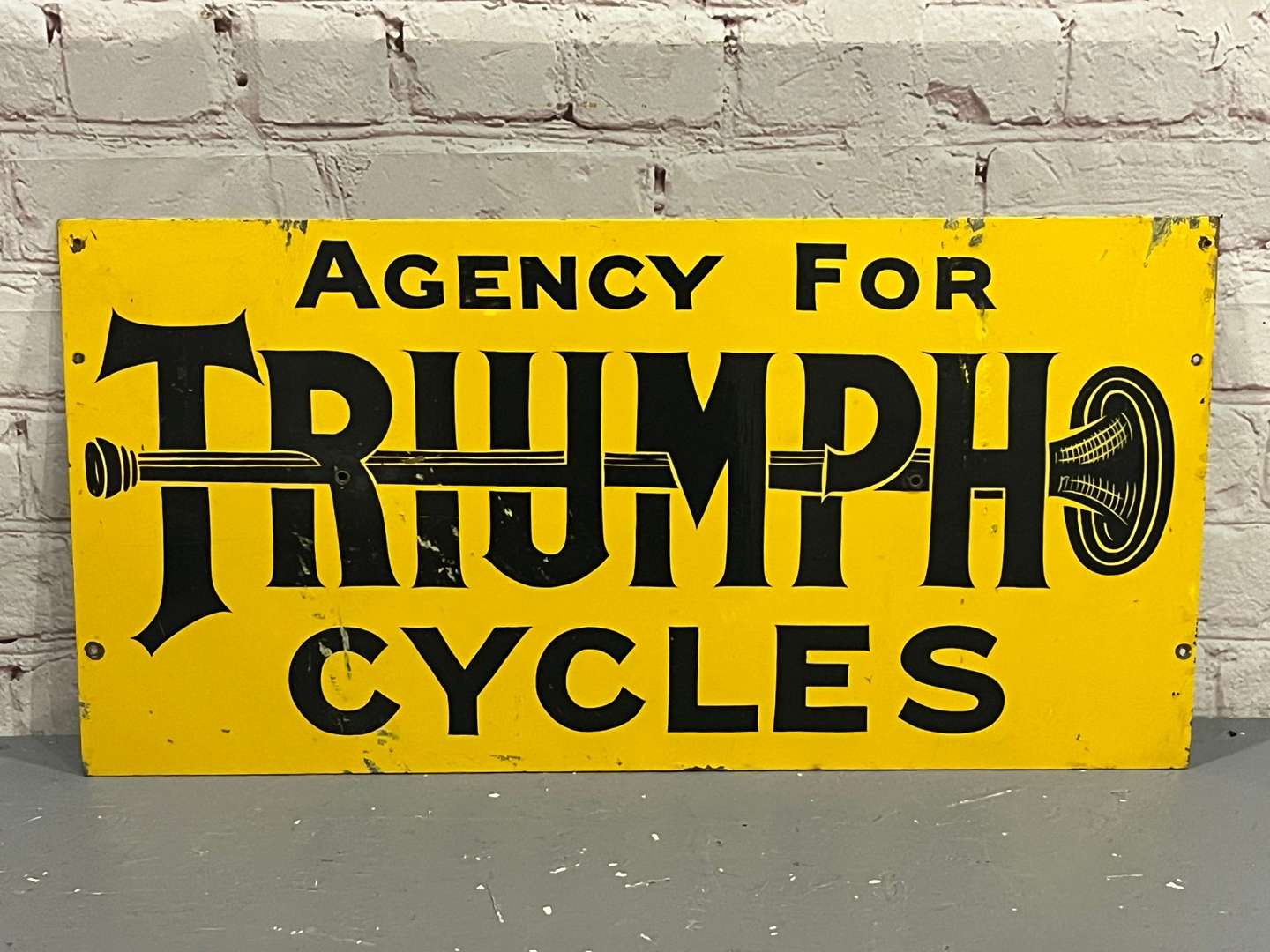 <p>Agency For Triumph Cycles Enamel Sign</p>