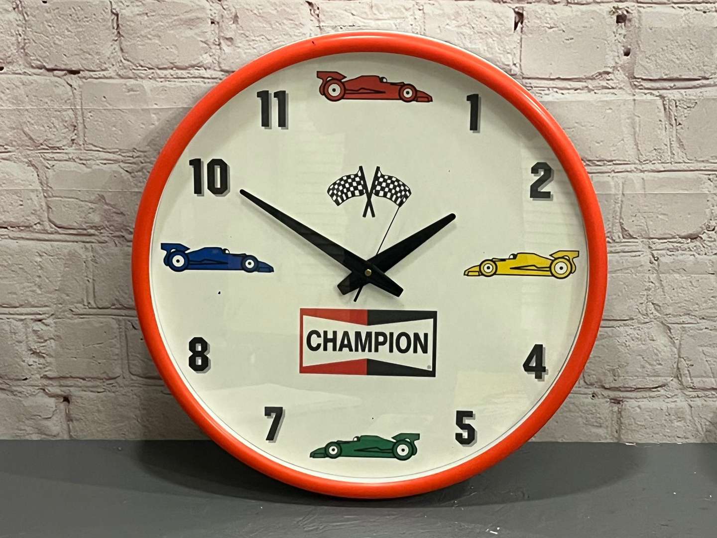 <p>Champion Spark Plug Wall Clock</p>