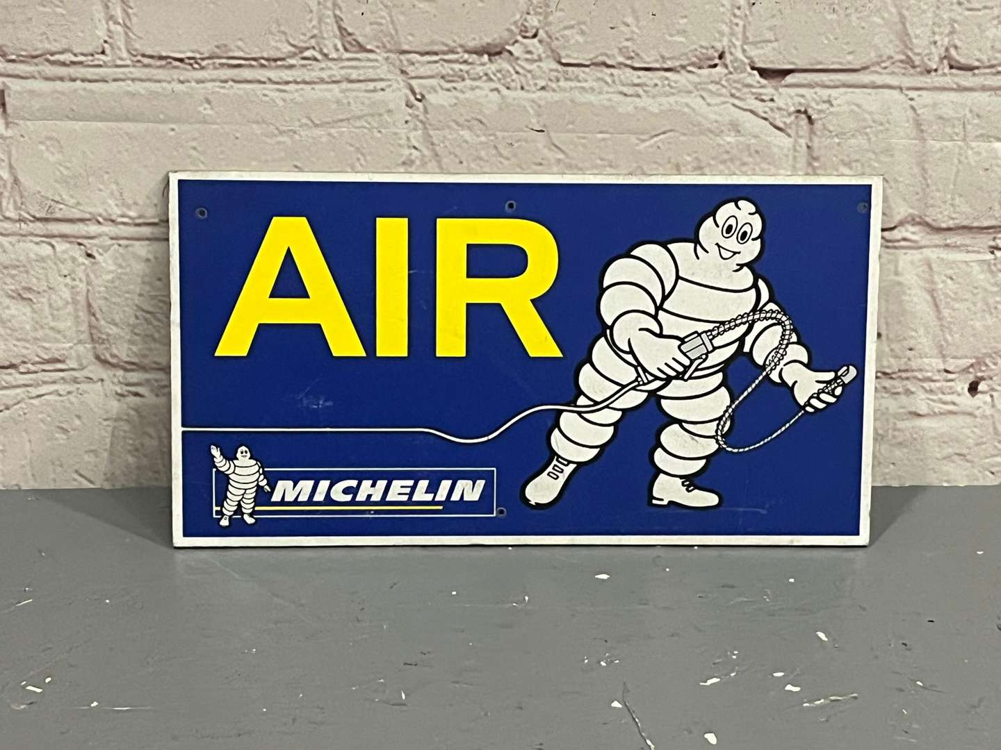 <p>Michelin Man Air Pressure Sign on Board</p>
