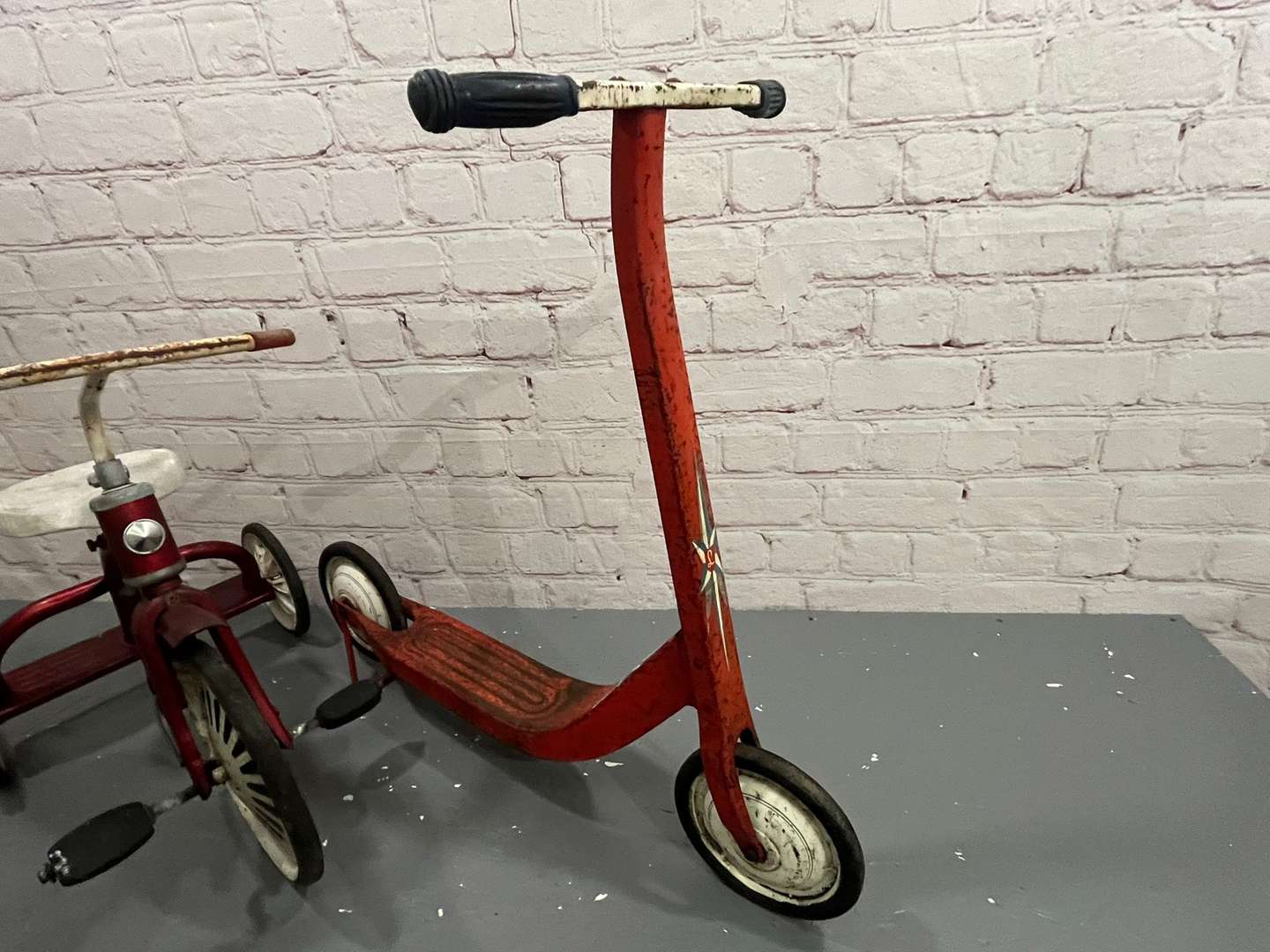 <p>Tri-ang Childs Tricycle and Lines Scooter (2)</p>