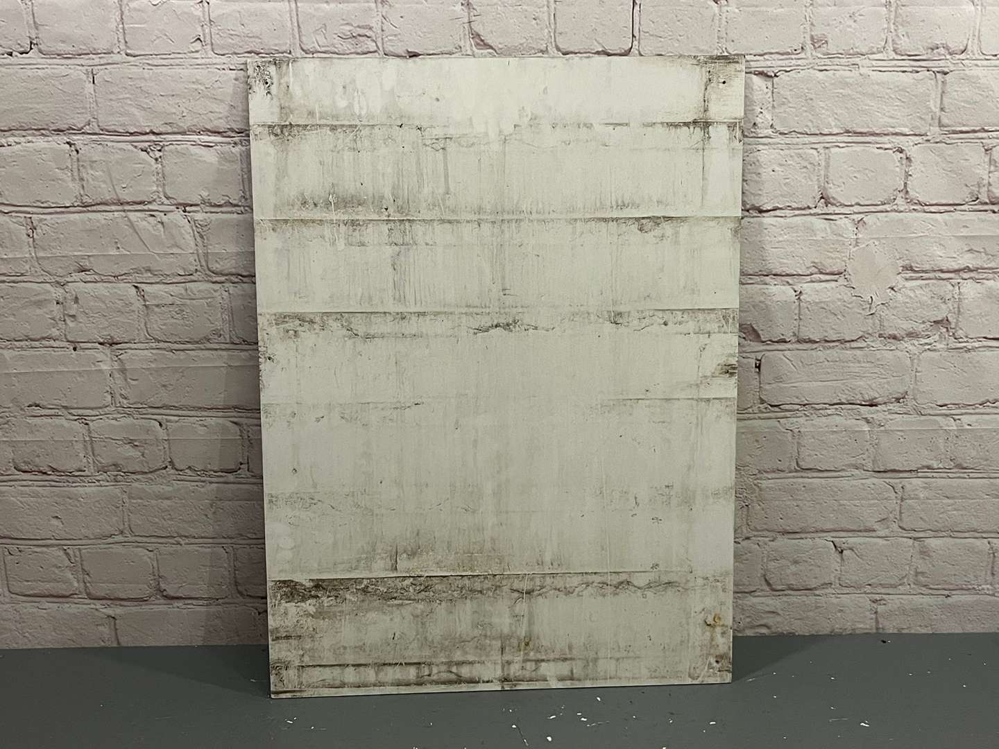 <p>Michelin Waving Man Sign on Board</p>