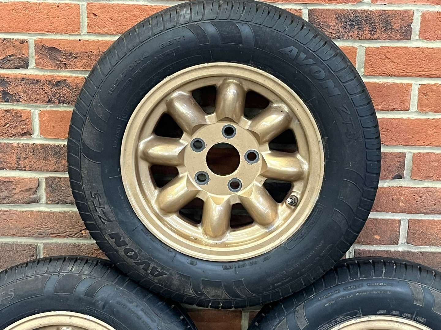 <p>Five Gold Alloy Minilite Wheels</p>