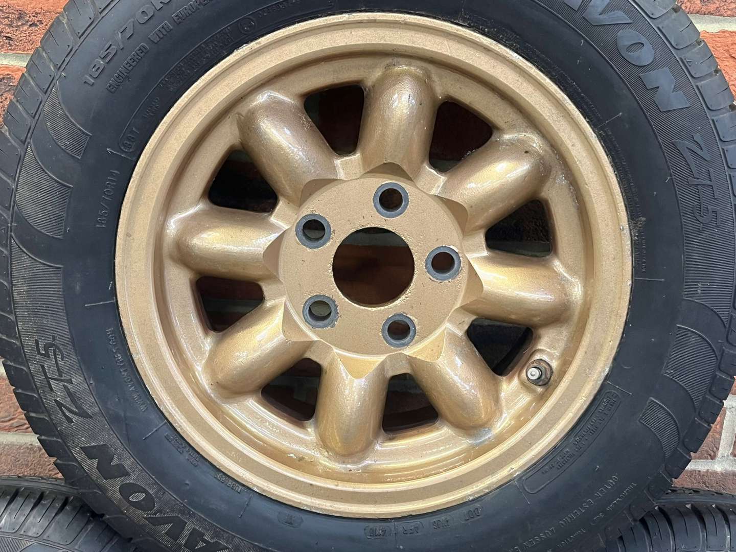 <p>Five Gold Alloy Minilite Wheels</p>