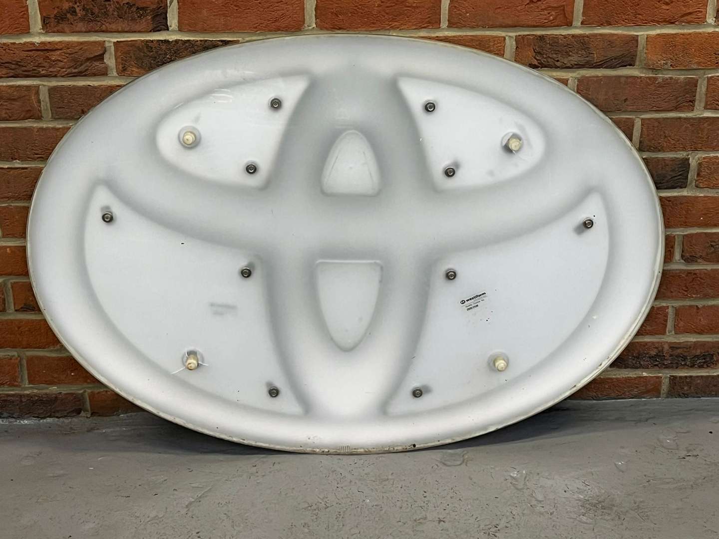 <p>Toyota Emblem Dealership Sign</p>