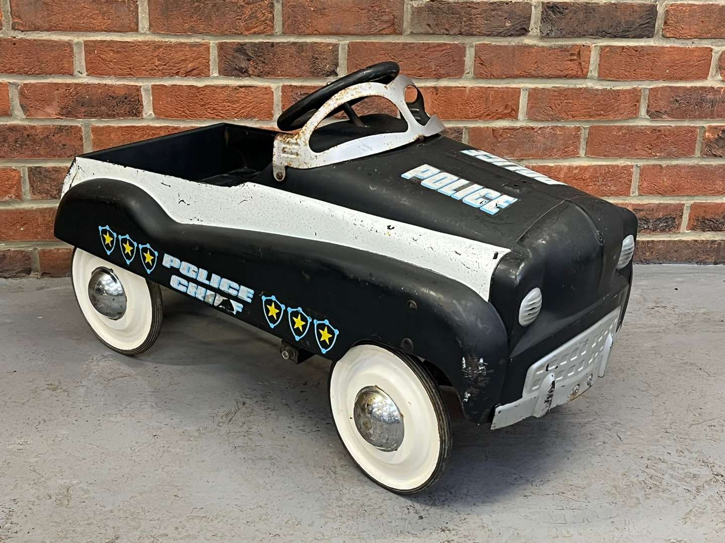 <p>Police Tin Plate Childs Pedal Car</p>