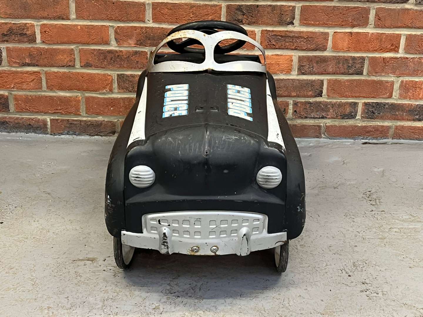 <p>Police Tin Plate Childs Pedal Car</p>