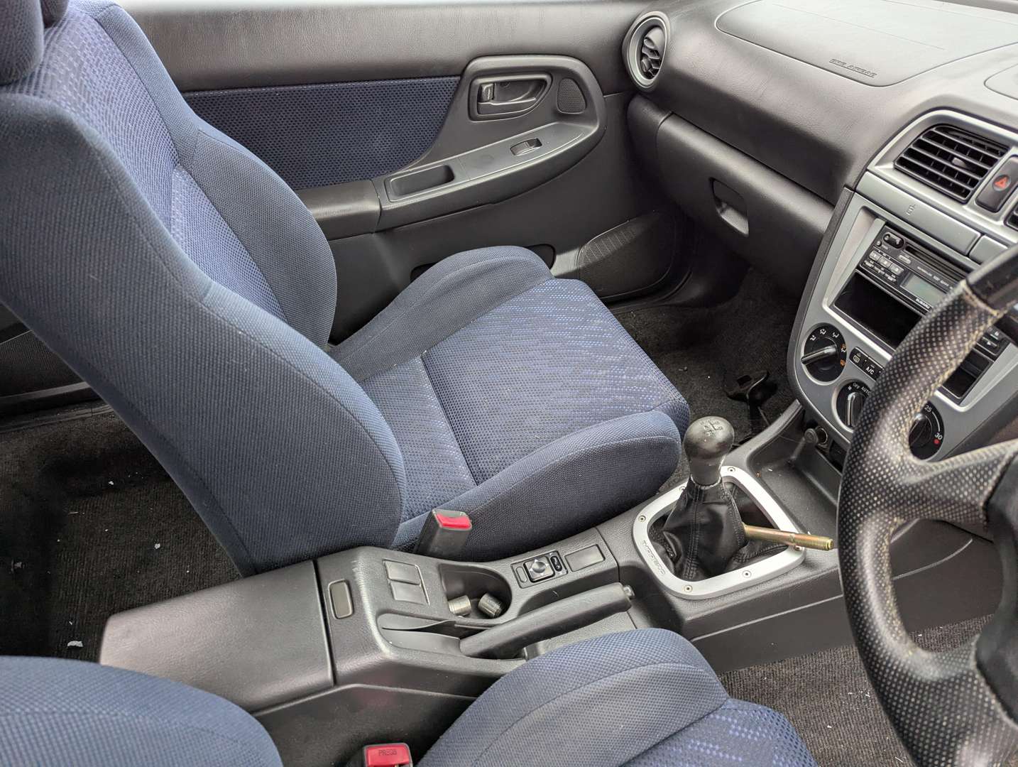 <p>2003 SUBARU IMPREZA GX AWD</p>