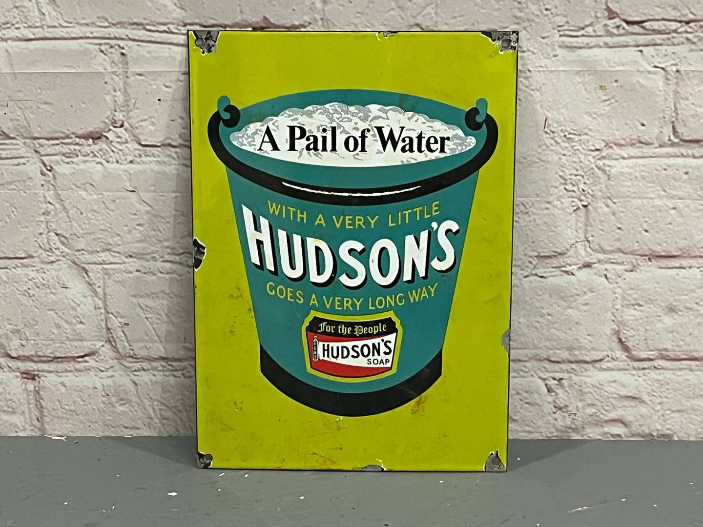 <p>Hudsons Soap Pail Enamel Sign&nbsp;</p>