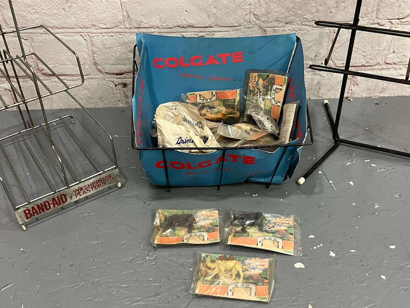 <p>Band Aid, Colgate and Sellotape Wirework Shop Display Stands (3)</p>