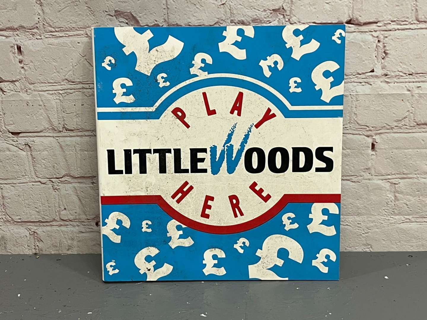 <p>Play Littlewoods Here Plastic Flange Sign</p>