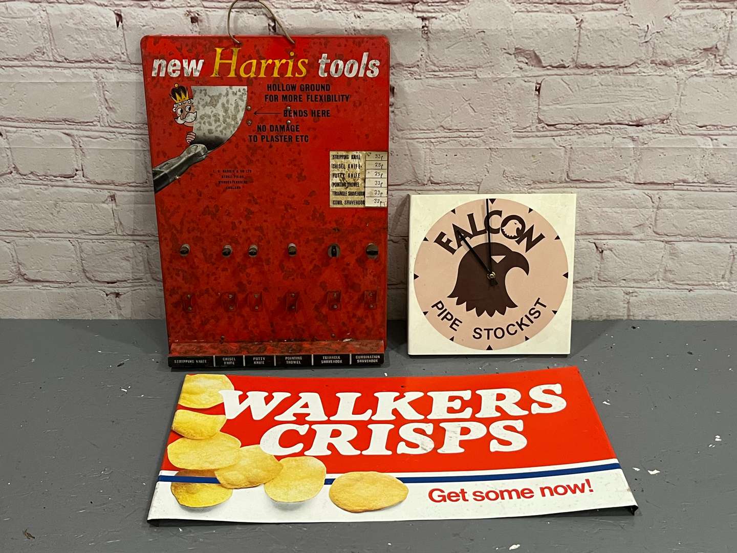 <p>Harris Tools, Walkers Crisps Metal Displays & Falcon Pipe Stockist Clock (3)</p>