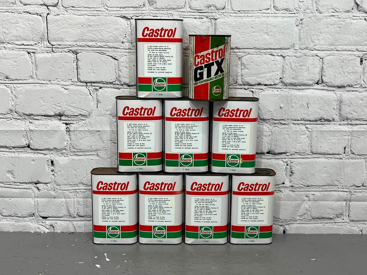 <p>Eight Castrol Solvent Flushing Oil Cans & GTX Can (9)</p>