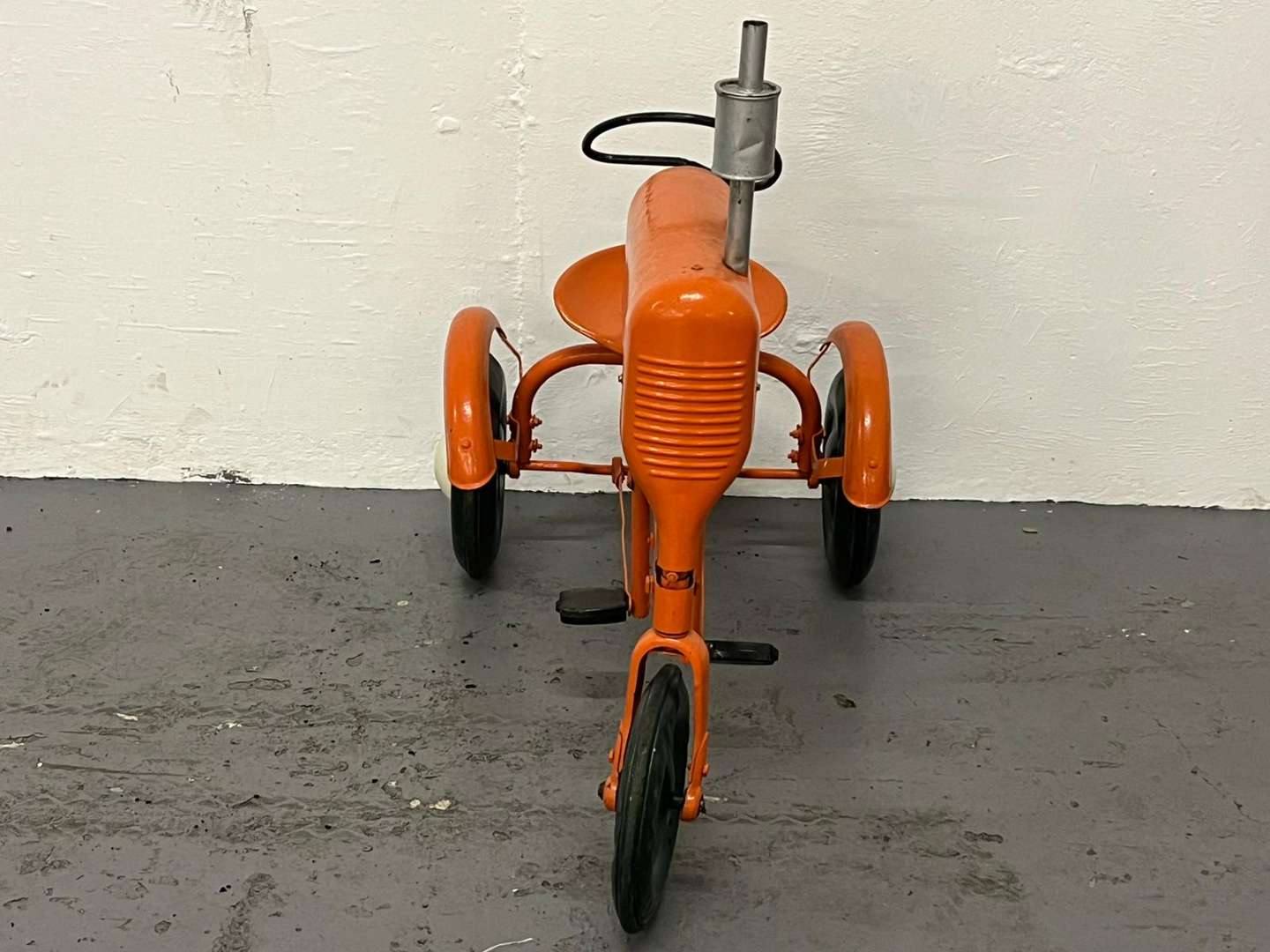 <p>Tri-ang Tin Plated Pedal Tractor</p>