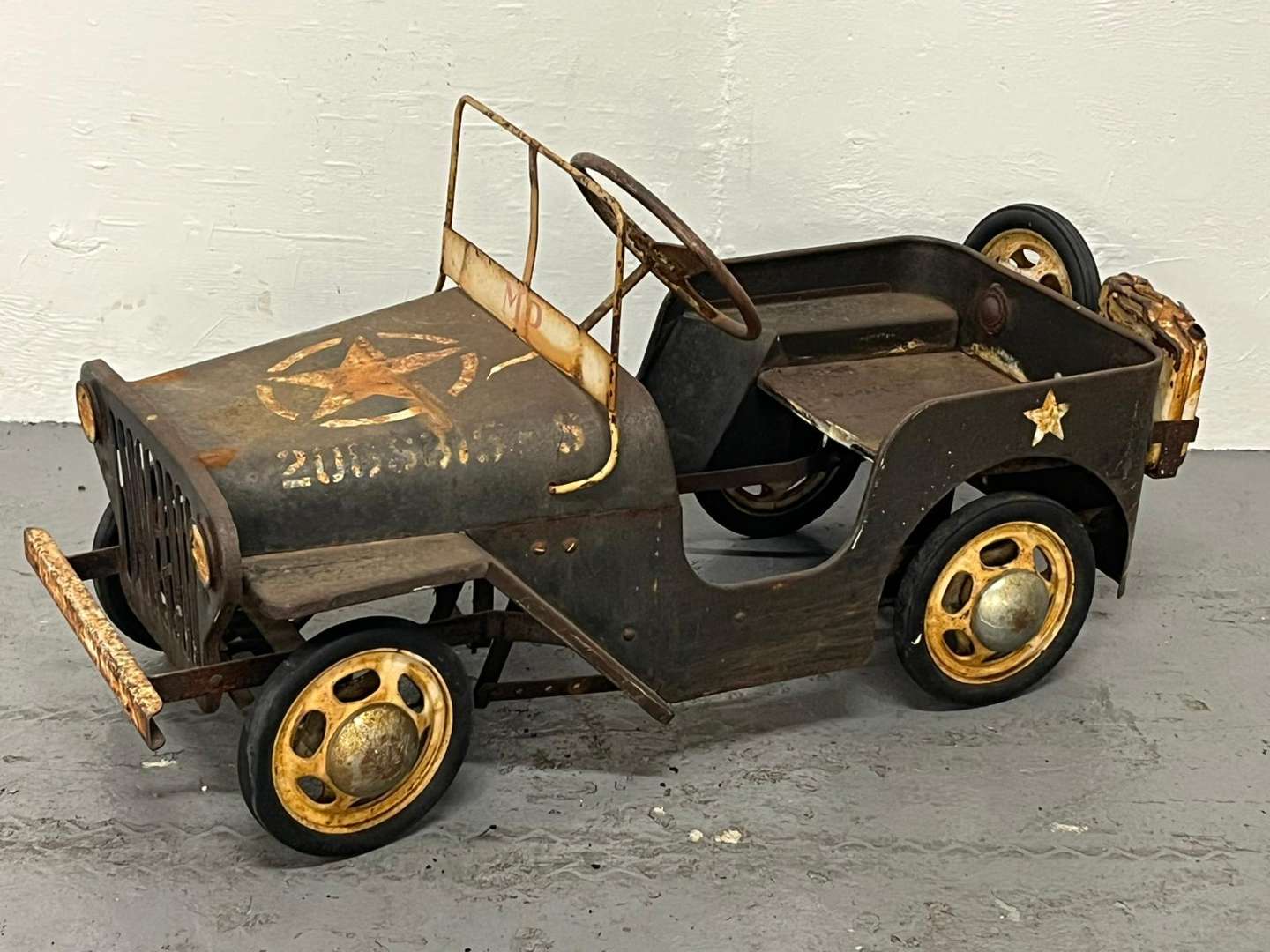 <p>Willys Tin Plated Childs Pedal Jeep</p>
