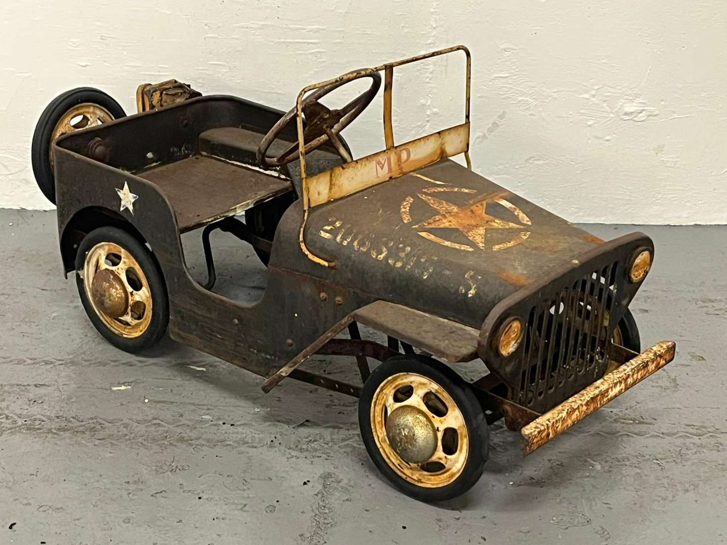 <p>Willys Tin Plated Childs Pedal Jeep</p>