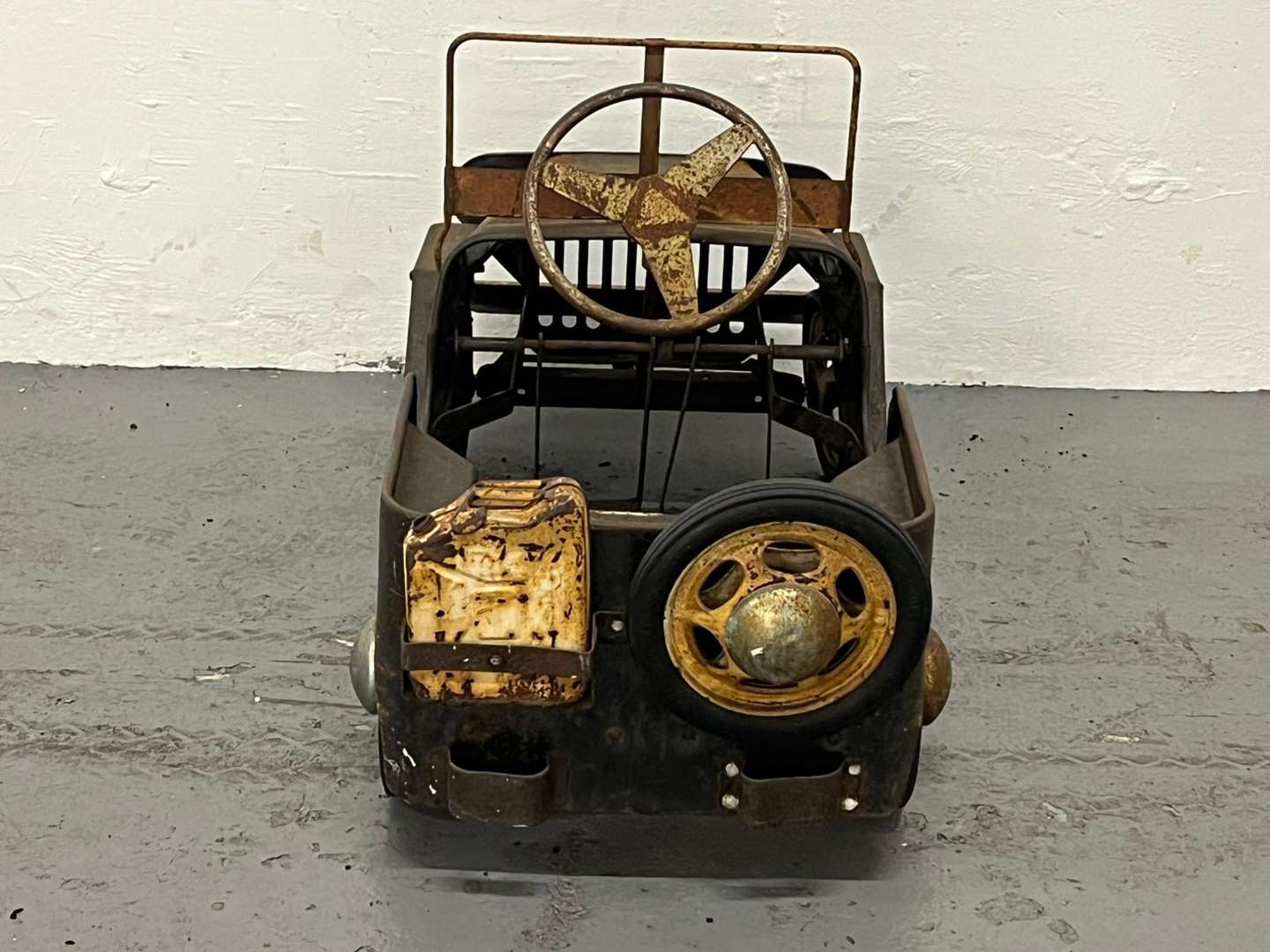 <p>Willys Tin Plated Childs Pedal Jeep</p>
