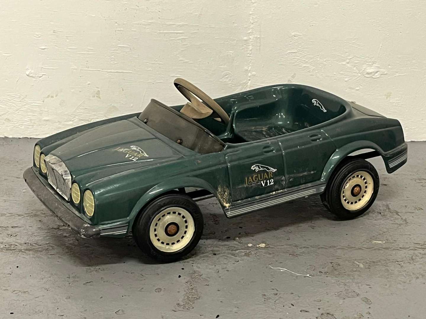 <p>Jaguar Plastic Childs Pedal Car</p>
