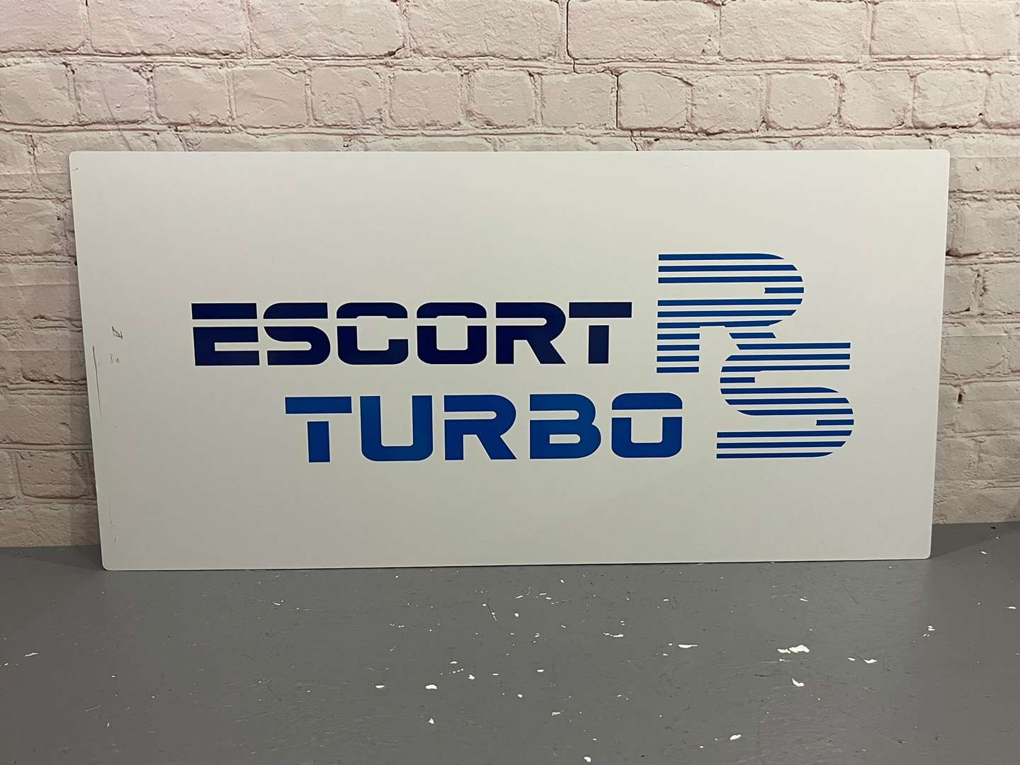 <p>RS Escort Turbo Sign On Metal Board</p>