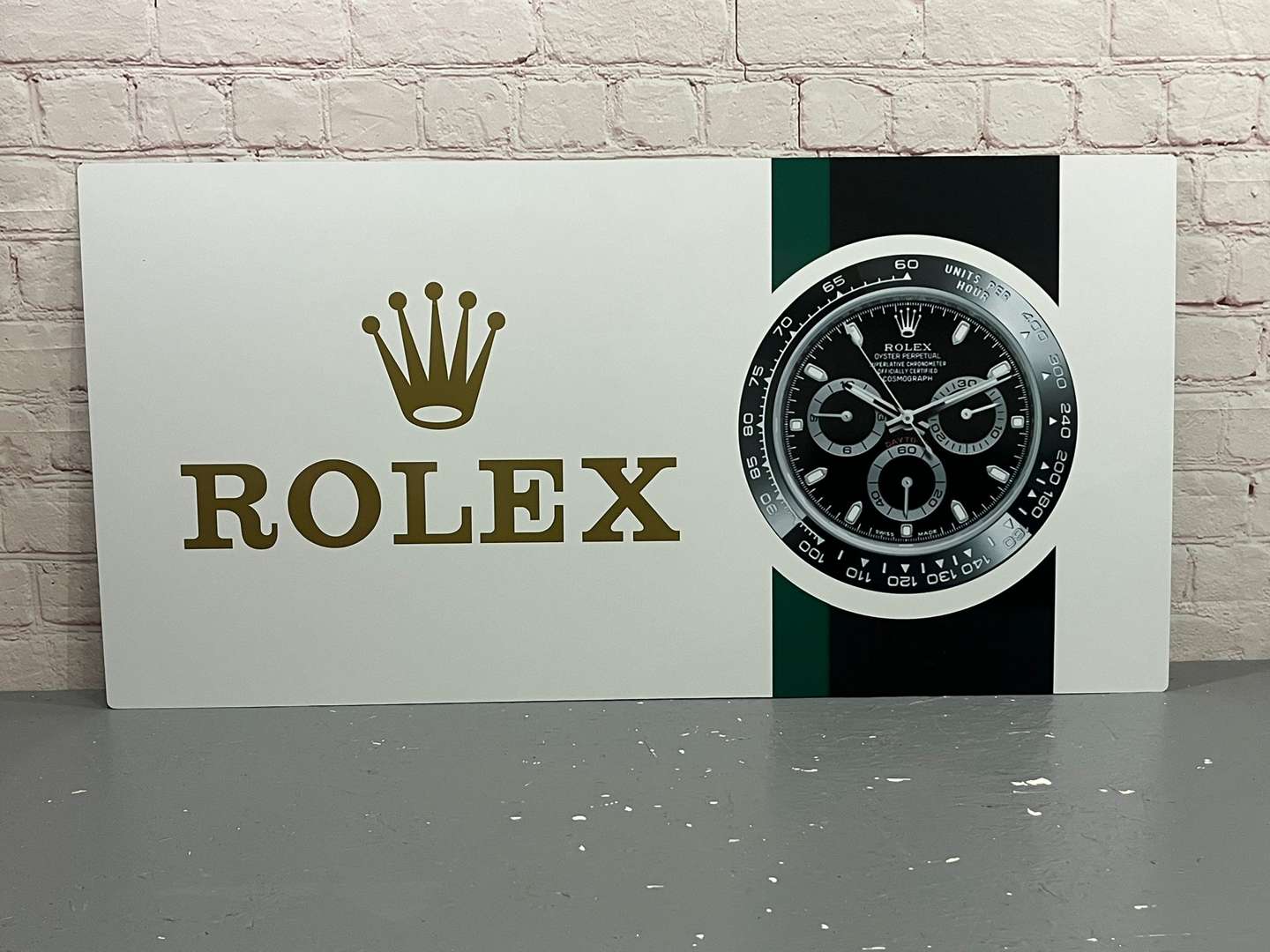 <p>Rolex Sign on Metal Board&nbsp;</p>