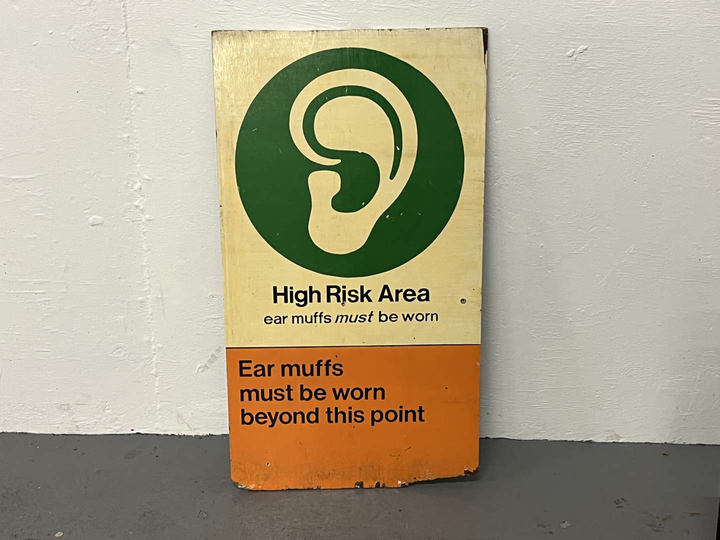 <p>High Risk Area Ear Muff Wooden Painted Sign</p>