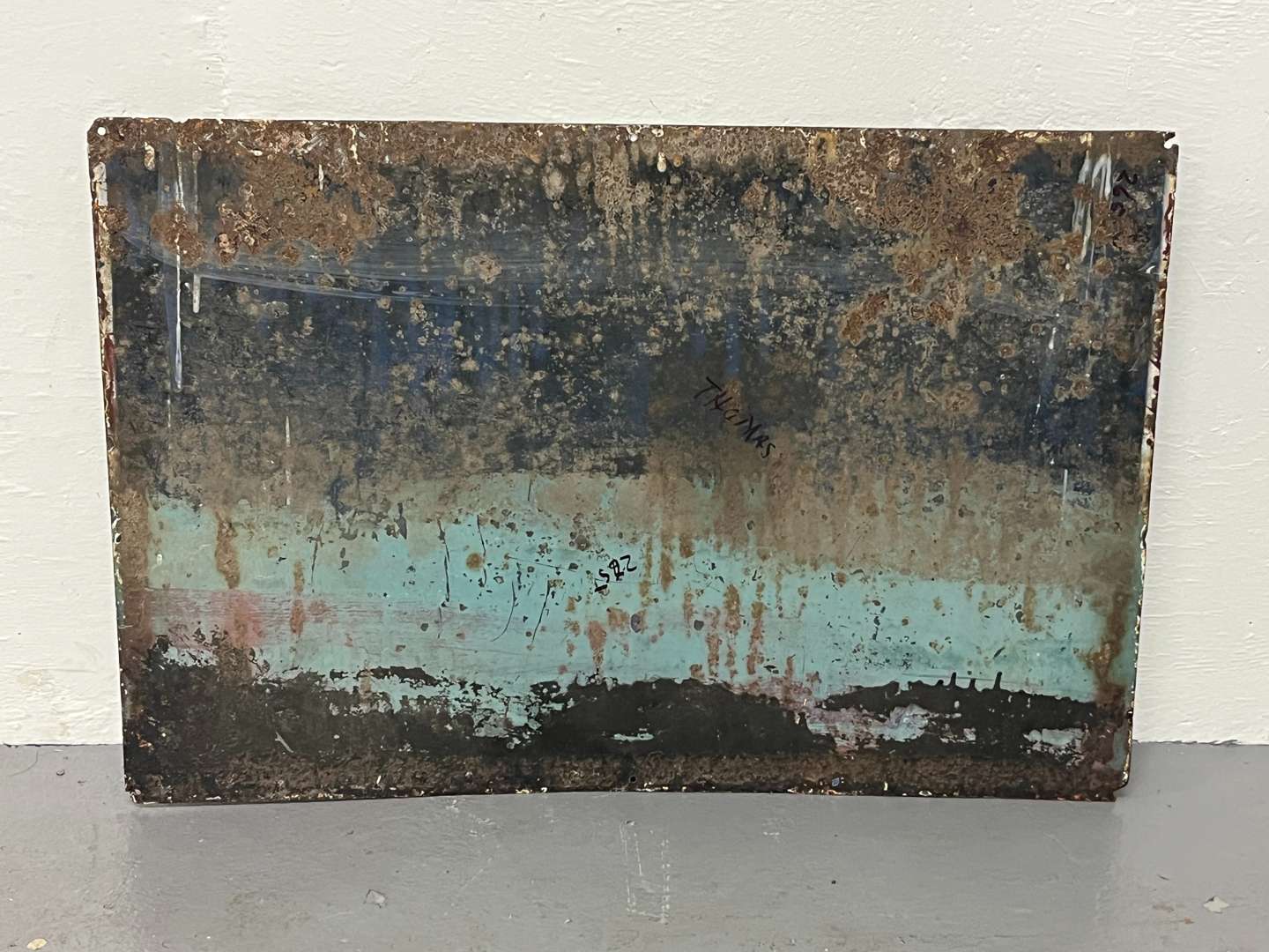 <p>Wm C. Thomas Drapery Enamel Sign</p>