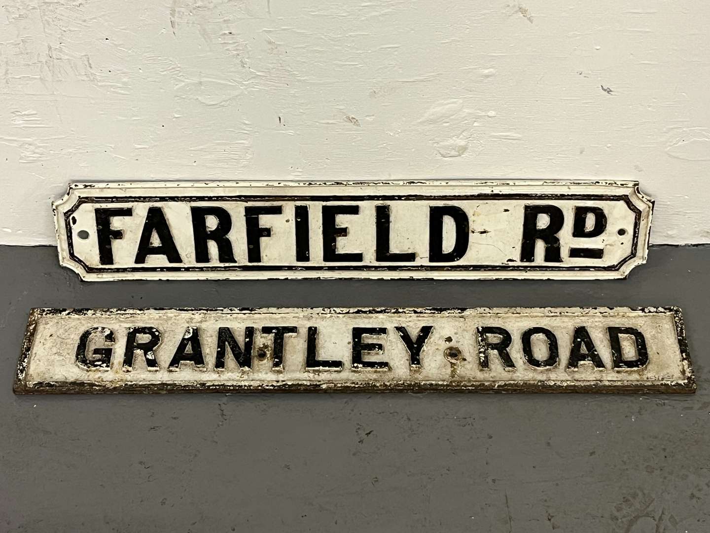 <p>Two Cast Iron Street Signs</p>