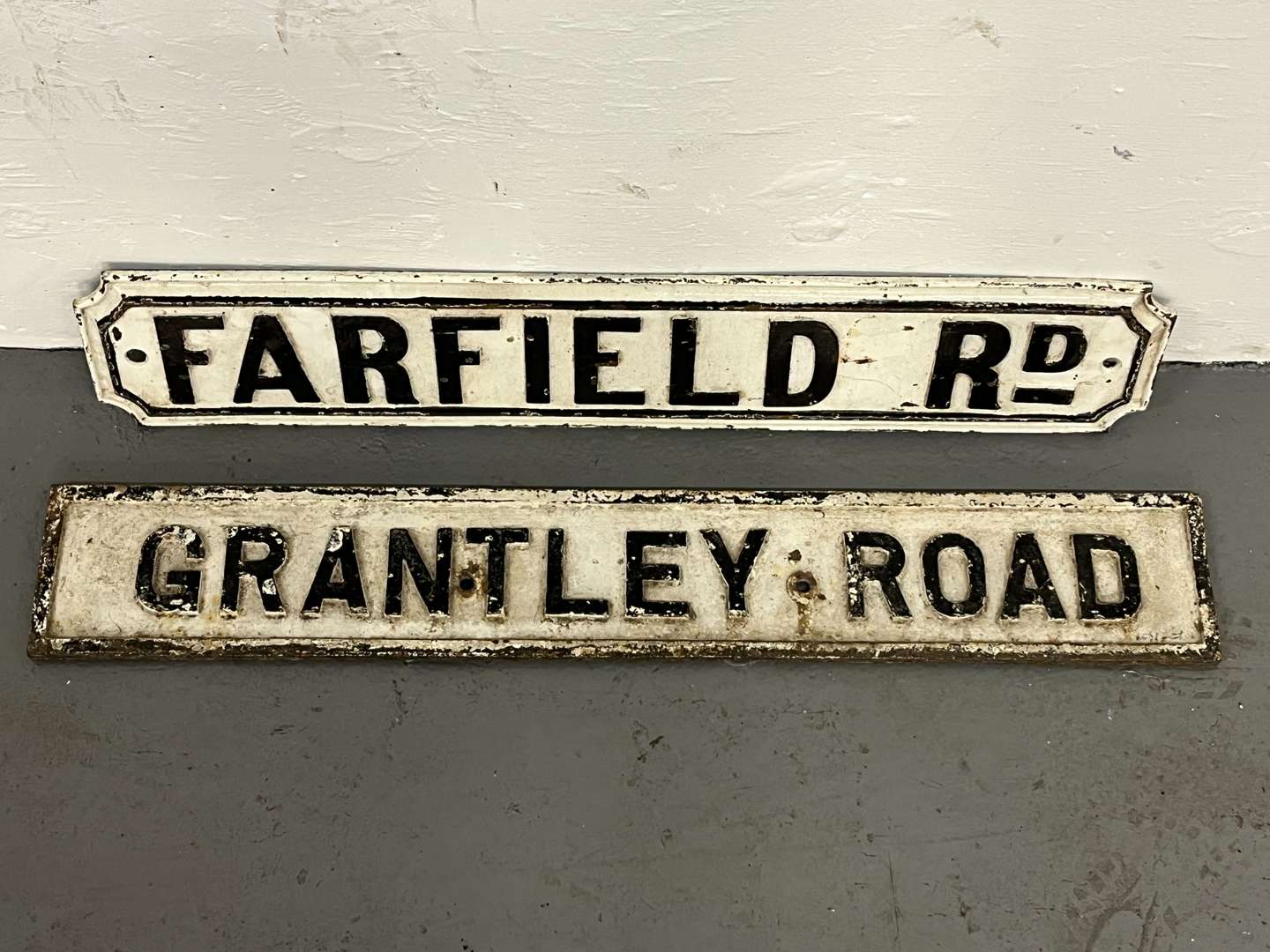 <p>Two Cast Iron Street Signs</p>