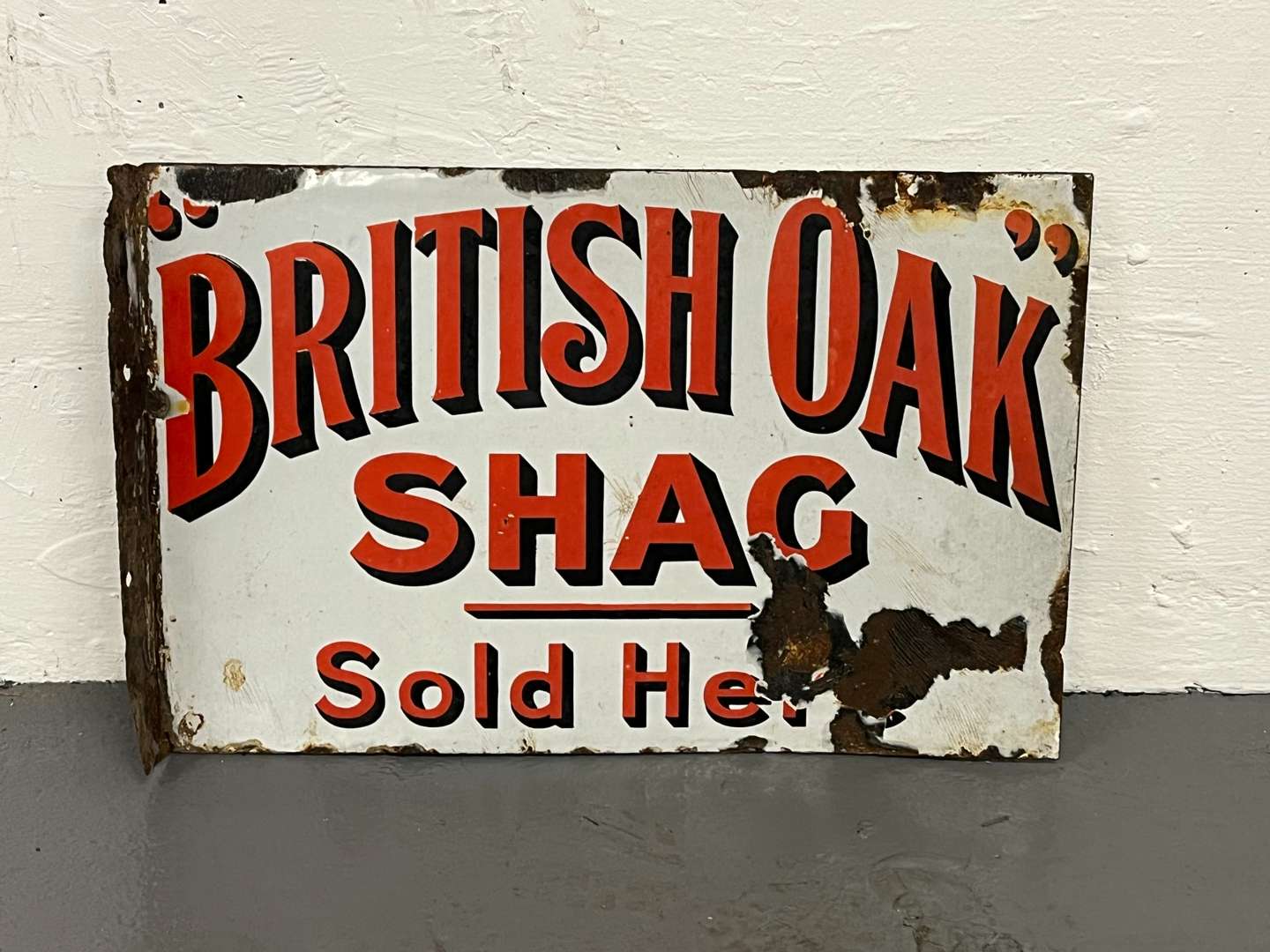 <p>British Oak Shag Sold Here Enamel Flange Sign</p>