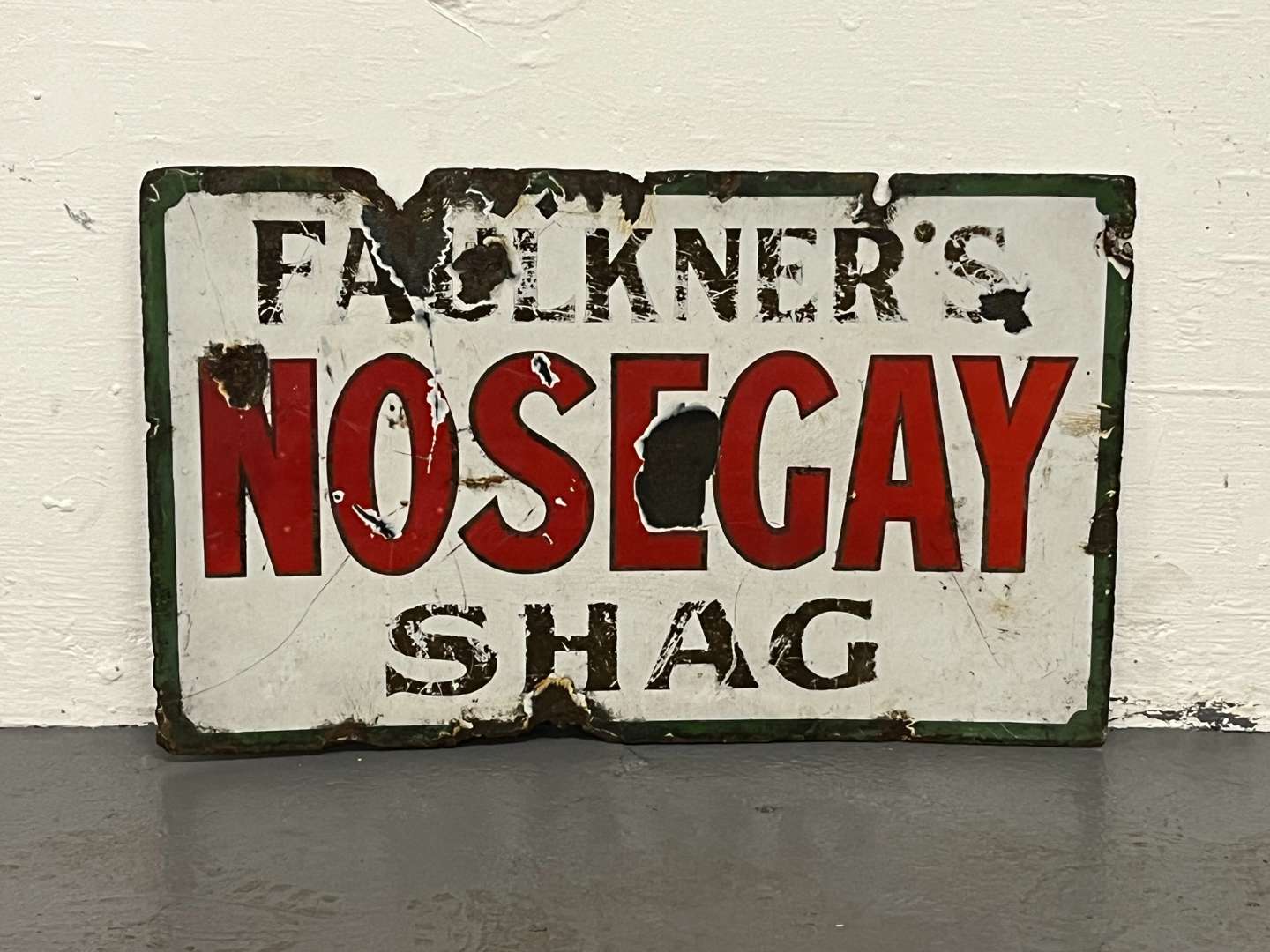 <p>Faulkners Nosegay Shag Enamel Sign</p>