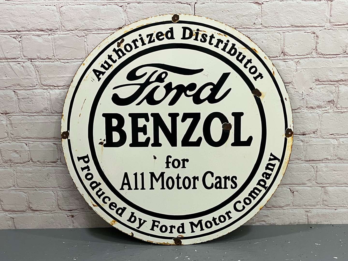 <p>Ford Benzol Authorized Distributor Circular Enamel Sign</p>