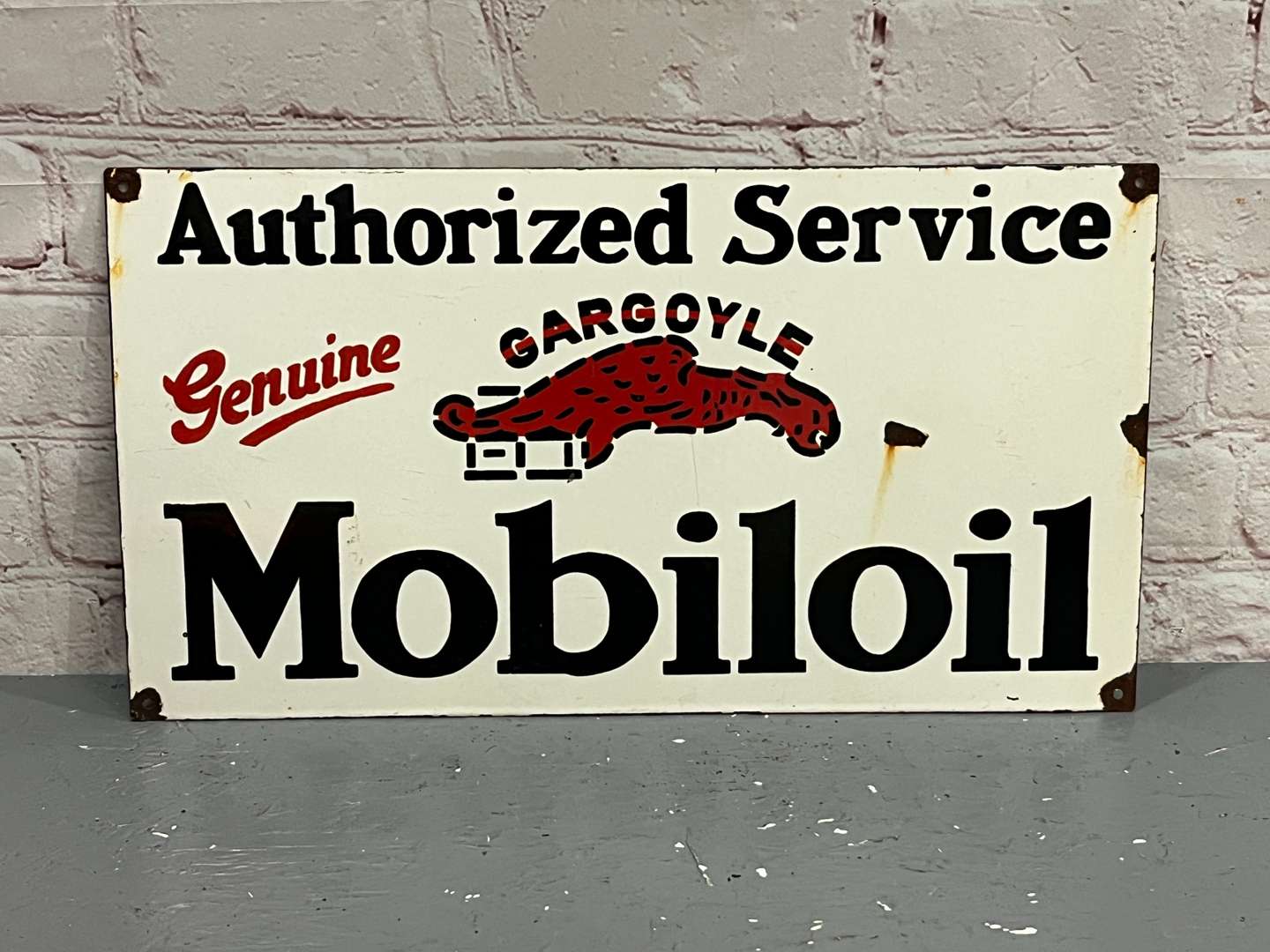 <p>Gargoyle Mobiloil Authorized Service Enamel Sign</p>